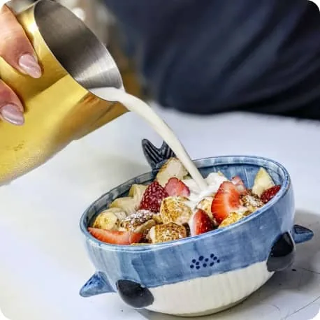 Bowl of fresh fruit with yogurt